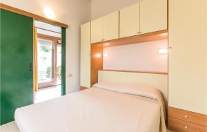Ein Bett oder Betten in einem Zimmer der Unterkunft Apartment Camping del Sole - 02