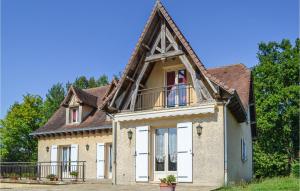 a house with a gambrel roof at Lovely Home In Savignac-Ledrier in Payzac +20 photos