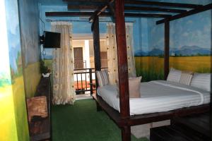 Cama o camas de una habitación en Huen Chan Thip