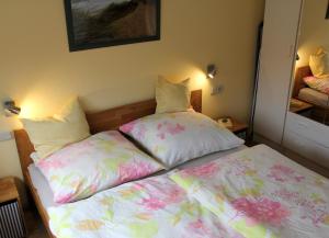 Postel nebo postele na pokoji v ubytování Strandnest + 22 fotografií