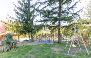 a park with a picnic table and a swing at La Casetta in Marcoiano +17 photos
