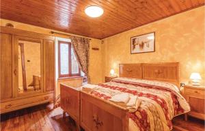 A bed or beds in a room at La Pila