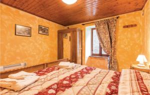 A bed or beds in a room at La Pila