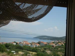 a view from a window of a town and water at Apartmani Mislav in Slatine