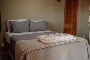 Een bed of bedden in een kamer bij Vila Bonita