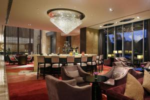Ein Sitzbereich in der Unterkunft The QUBE Hotel Shanghai -Close to Pudong International Airport and Disney Land