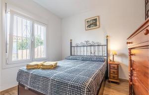 Łóżko lub łóżka w pokoju w obiekcie 3 Bedroom Nice Home In Vélez Málaga