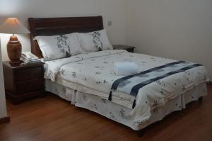 Letto o letti in una camera di Jeruton Hotel