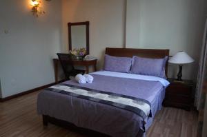 Letto o letti in una camera di Jeruton Hotel