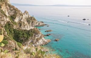 a view of the ocean from a cliff at Villa Anna in Capo Vaticano