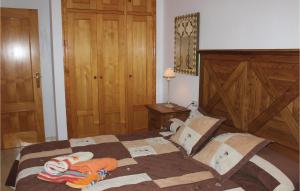 A bed or beds in a room at Amazing Apartment In Isla Plana With House Sea View