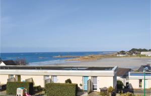 a house with a view of the ocean at Stunning Apartment In Trevou Treguignec in Trévou-Tréguignec +16 photos