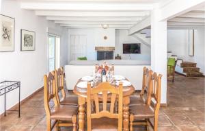 a dining room with a table and chairs at Gorgeous Home In Cádiz With Wifi in El Gastor