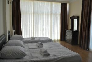 Letto o letti in una camera di Black Sea Hotel