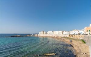 a view of a beach with buildings and the ocean at Awesome Apartment In Gallipoli With 3 Bedrooms in Gallipoli