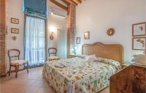 A bed or beds in a room at Casa Monica