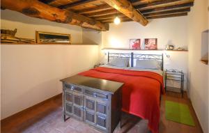 A bed or beds in a room at Casa Maria Pieve
