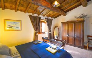 A bed or beds in a room at Casa Maria Pieve