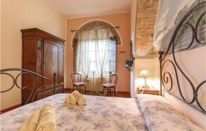 A bed or beds in a room at Monterufoli Giulia 6G