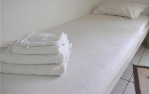 Cama ou camas em um quarto em Soleiliosonne Haus Minos
