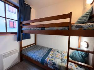 Кровать или кровати в номере T2 + alcôve. Balcon. Parking couvert. Piscine été. +14 фотографий