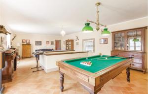 a pool table in the middle of a room at Villa Gagliardi in Cerreto Sannita