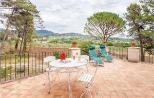 a patio with a table and chairs on a fence at Villa Gagliardi in Cerreto Sannita +20 photos