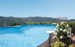 a swimming pool with a view of the mountains at La Rosa E Il Limone in Montemagno +21 photos