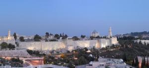 a view of the old city of jerusalem at night at Mamilla Hotel in Jerusalem