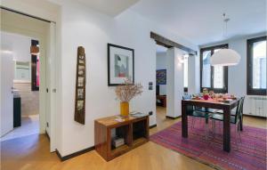 a living room with a table and a dining room at Stunning Apartment In Venezia -Ve- in Venice