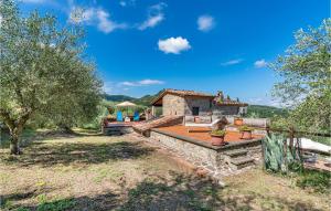 an external view of a house with a garden at La Selvarella in Seggiano +15 photos