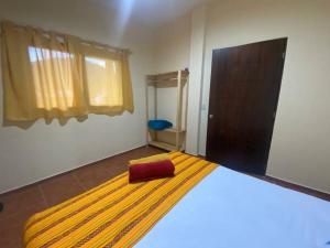 Postel nebo postele na pokoji v ubytování Casa SanMar cerca de la playa
