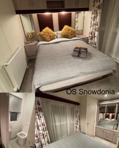 سرير أو أسرّة في غرفة في Snowdonia Holidays Caravan Hire - Aberdunant Park - 111 Silver Birch
