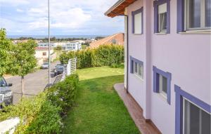 a view from the balcony of a house with a yard at Villetta Il Mirto in Belladonna