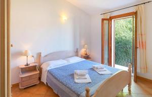 A bed or beds in a room at Bilo 4