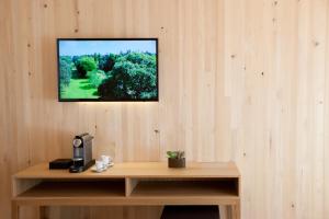 TV a/nebo společenská místnost v ubytování Hotel am Garnmarkt