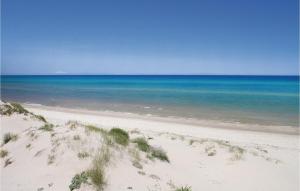 Fotografia z galérie ubytovania Trilo Beach v destinácii Monte Nai