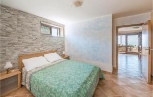 Casa In Riva Al Mare 2 tesisinde bir odada yatak veya yataklar