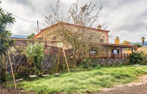 a house with a garden in front of it at Holiday Home Hoya Los Charcos in Icod el Alto