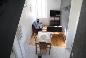 TV a/nebo společenská místnost v ubytování Le temps d'une pause''