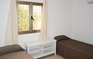 a living room with a couch and a window at Casa Villa Carla in Palma de Mallorca