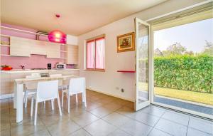 A kitchen or kitchenette at Nice Apartment In Puegnago Sul Garda