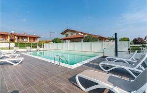The swimming pool at or close to Nice Apartment In Puegnago Sul Garda