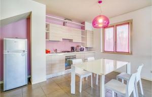 A kitchen or kitchenette at Nice Apartment In Puegnago Sul Garda