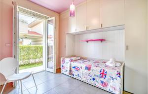 A bed or beds in a room at Nice Apartment In Puegnago Sul Garda