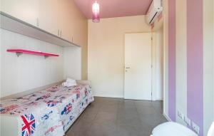 A bed or beds in a room at Nice Apartment In Puegnago Sul Garda