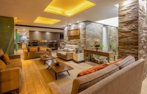 Χώρος καθιστικού στο Sonesta Hotel Cusco