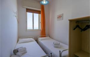 Posteľ alebo postele v izbe v ubytovaní La Casa In Riva Al Mare
