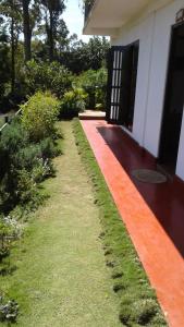 an orange stripe on the side of a house at Green Gregory Villa Nuwara Eliya in Nuwara Eliya