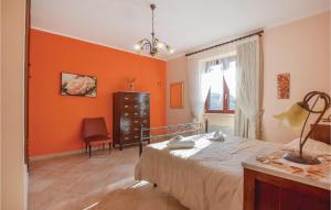 A bed or beds in a room at Villa Aquaro